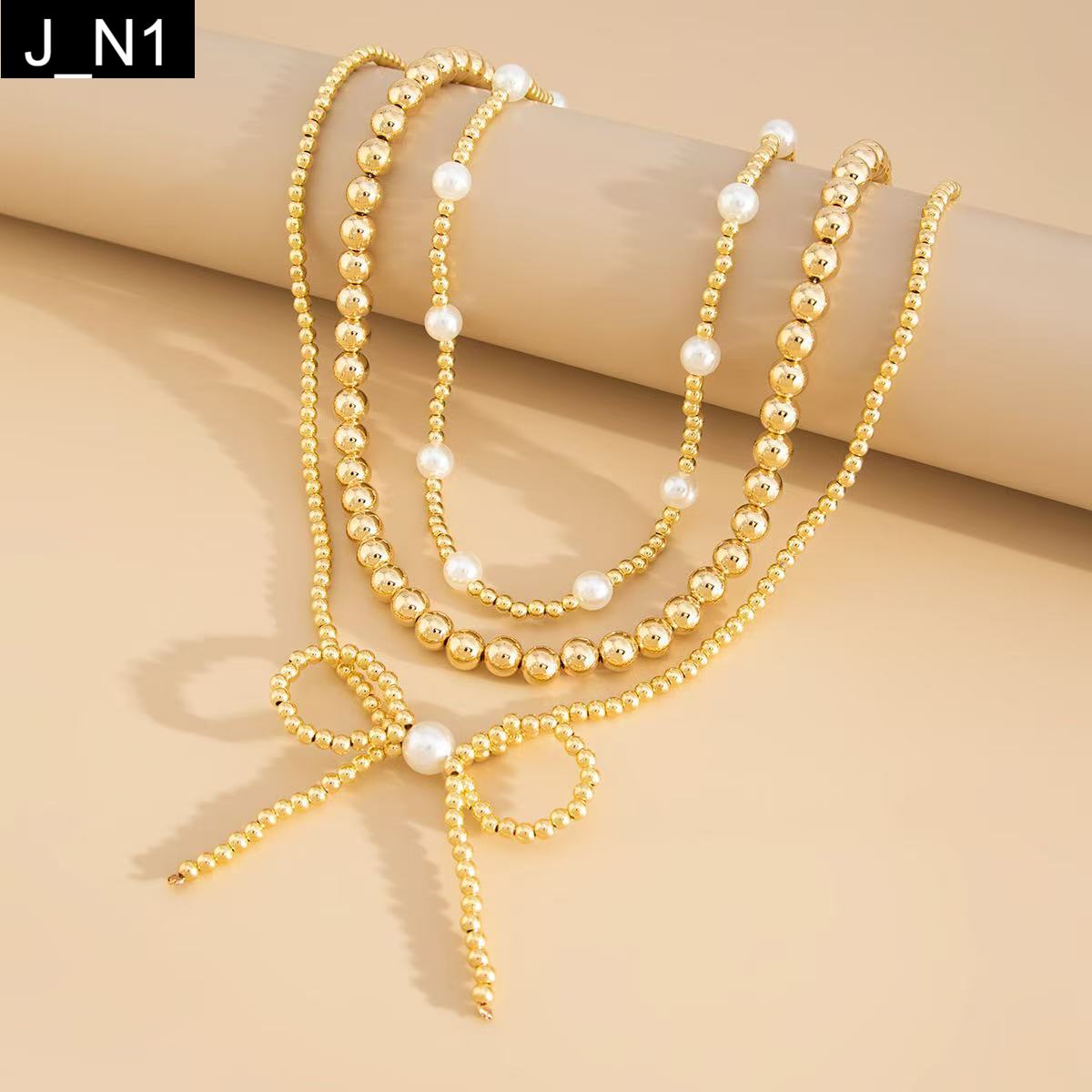 Midas Bow Necklace - N1