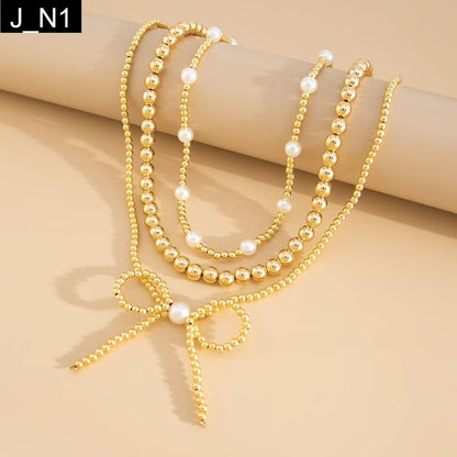 Midas Bow Necklace - N1