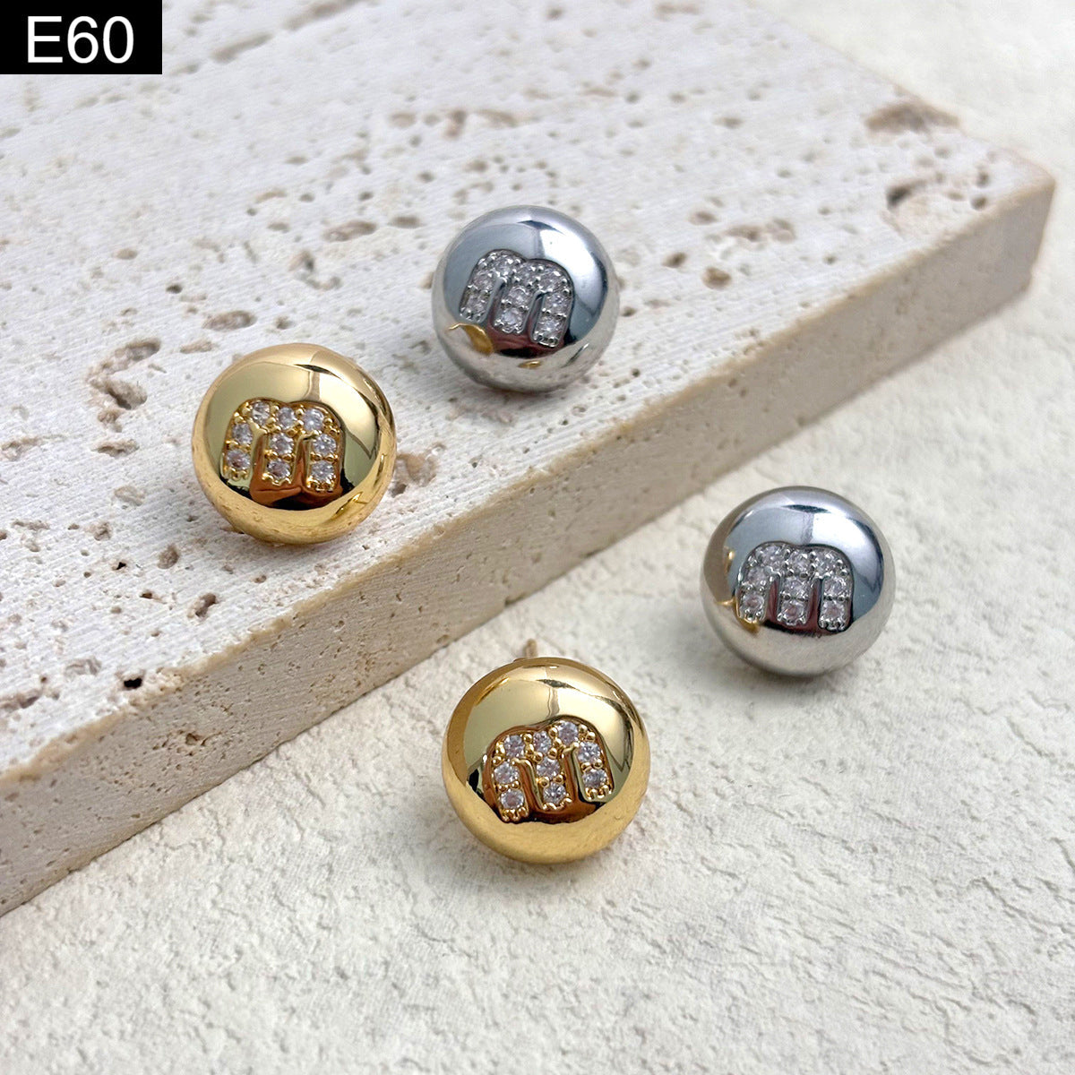 Monogram Orb Studs - E60
