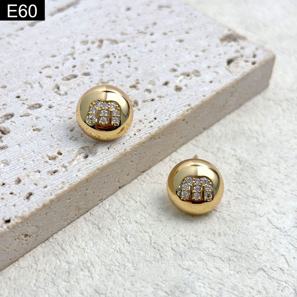Monogram Orb Studs - E60