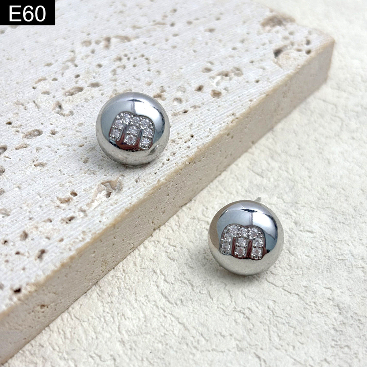 Monogram Orb Studs - E60